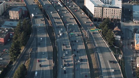 Slow-Tracking-Drone-Shot-of-Afternoon-Freeway-Traffic-with-Long-Shadows