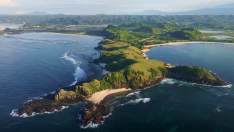 A-hidden-treasure-Island-with-a-stunning-cliffs-by-the-sea-and-the-breathtaking-backdrop-of-volcanoes-in-Mandalika-Village,-West-Nusa-Tenggara,-Lombok-Island