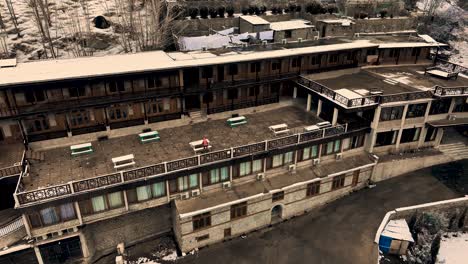 Aerial-View-Of-Remote-Hotel-Building-In-Karimabad,-Capital-Of-Hunza-District-In-Pakistan