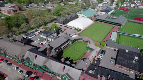 Down-tilting-aerial-shot-of-the-Tennis-Hall-of-Fame-in-Newport,-Rhode-Island
