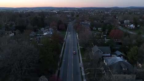 Birds-Eye-aerial-over-Main-Street-of-suburbia-in-American-town