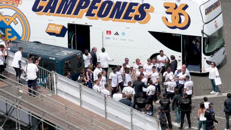 Real-Madrid-players-celebrate-winning-the-36th-Spanish-soccer-league-championship,-La-Liga-title-trophy-championship,-at-Cibeles-Square-in-Madrid,-Spain