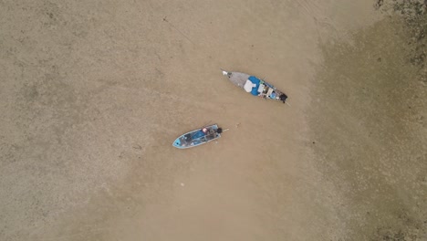 Aerial-Birds-Eye-View-Of-Fishing-Boats-On-Sandy-Ao-Tan-Beach-In-Koh-Mak