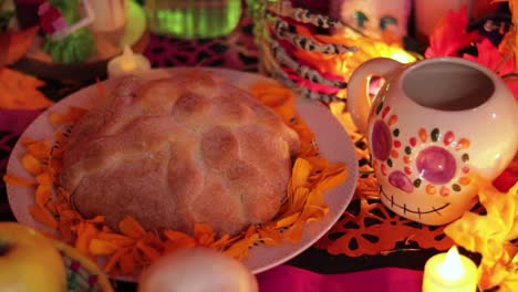 Bread-Offering-On-Decorated-Día-De-Los-Muertos-Altar-With-Candles