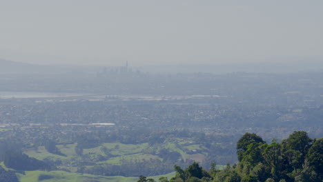 Auckland-city-skyline-in-the-distance,-New-Zealand