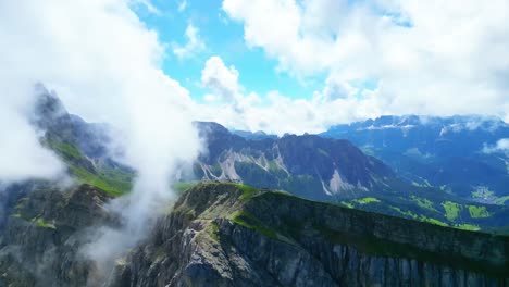 View-from-above,-stunning-aerial-view-of-the-mountain-range-of-Seceda-during-a-cloudy-day