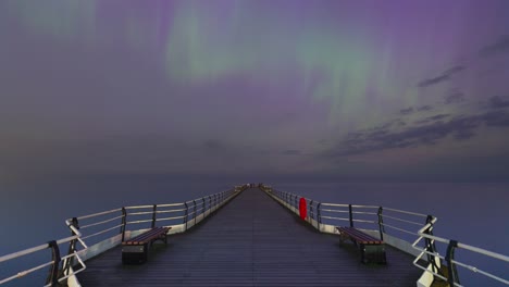 A-timelapse-of-the-aurora-storm-10th-May-2024-on-Saltburn-pier-in-Saltburn-by-the-sea,-England