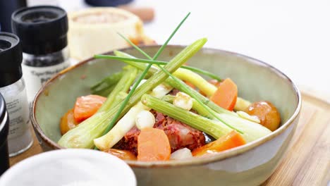 Close-up-shot-of-a-French-stew-decorated-with-a-selection-of-vegetables