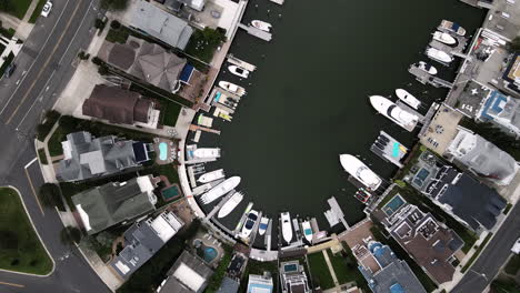 Aerial-Looking-Down-on-Bay-in-New-Jersey-with-Mansions-and-Yachts