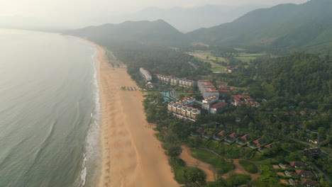 Drone-Rise-Above-Beautiful-Lang-Co-Beach-On-A-Hazy-Early-Morning-In-Vietnam