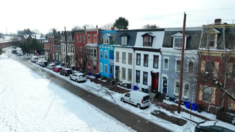 Colorful-row-houses-covered-in-snow-during-winter-in-Harrisburg,-PA