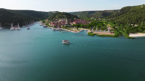 Sailing-Across-The-Sea-Near-Skradin-Town-Near-The-Krka-River-Entrance-To-Krka-National-Park-In-Croatia