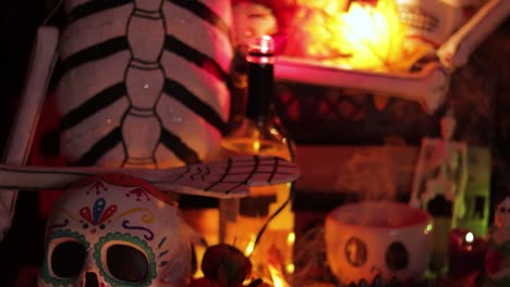 Skeleton-decorations-and-offerings-and-incense-on-Dia-de-Muertos-altar