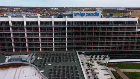 Front-Facade-of-Tervise-Paradiis-Hotel-in-Pärnu-in-aerial-Sliding-shot