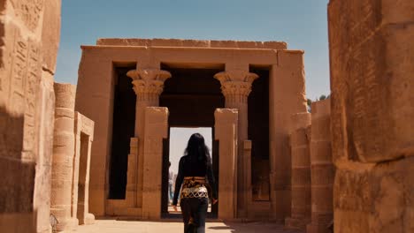 Tourist-Exploring-Ancient-Egyptian-Architecture