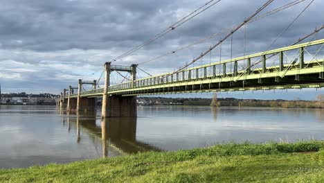 By-a-bridge-crossing-the-River-Loire-going-to-Ingrandes-Le-Fresne-sur-Loire