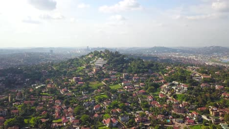 Bukasa-suburb,-Kampala,-the-capital-city-of-Uganda-drone-wide-cityscape