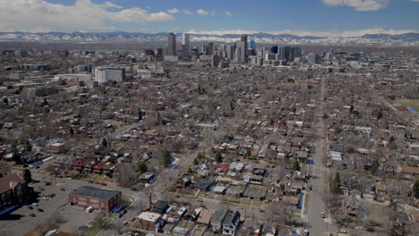 City-Wash-Park-Downtown-Denver-Colorado-Spring-Mount-Blue-Sky-Evans-Aerial-drone-USA-Front-Range-Rocky-Mountains-foothills-skyscrapers-neighborhood-streets-Ferril-Lake-daytime-sunny-clouds-circle-left