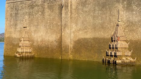 Traveling-detail-view-of-the-ruins-of-Wat-Wang-Wirekaram-temple,-part-of-the-amazing-underwater-city-of-Sangkhlaburi,-Thailand