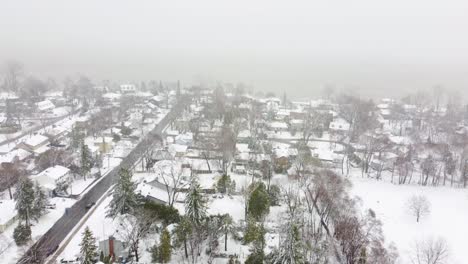 Heavy-snow-storm-in-the-city-Longueuil,-Canada,-extreme-weather-conditions,-flyover