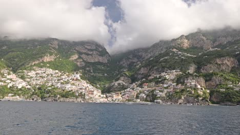 Approaching-Positano-by-ferry,-Positano-is-a-touristic-town-of-the-Amalfi-coast-in-Southern-Italy