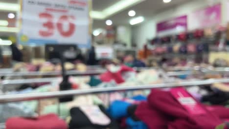 Defocused-footage-of-clothing-in-a-department-store