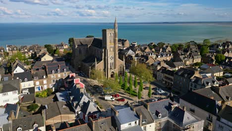 Saint-Meen-church-with-sea-in-background,-Cancale,-Brittany-in-France