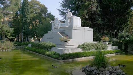 Bergamo-cinematic-movement-approaching-the-Gaetano-Donizetti-monument-located-near-the-homonymous-theater