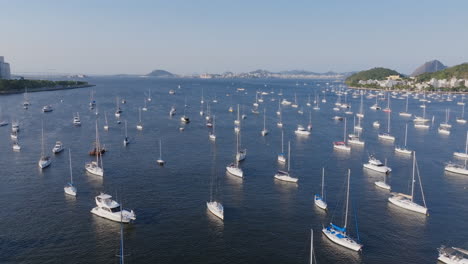Aerial-flyover-footage-of-sailboats-anchored-in-Botafogo-Bay-in-Rio-de-Janeiro