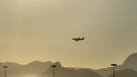 Slow-motion,-aerial-footage,-showing-an-airplane-about-to-land-in-Rio-de-Janeiro