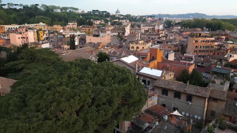 Amazing-Drone-Shot-Above-Trastevere-Cathedral-Bell-Tower,-Reveals-Beautiful-Neighborhood