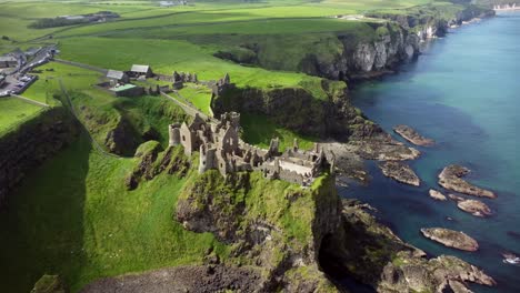 Aerial-shot-of-Dunluce-Castle,-in-Bushmills-on-the-North-County-Antrim-coast-in-Northern-Ireland