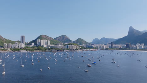 Static-aerial-footage,-hovering-over-the-sailboats-anchored-in-both-of-Fogo-Bay-and-Rio-de-Janeiro-Brazil