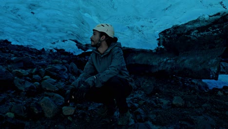 Man-in-a-cave-in-The-Perito-Moreno-Glacier,-the-most-iconic-glacier-in-the-world