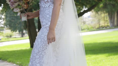 Bride-standing-beautifully-in-wedding-dress