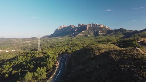 Montserrat-mountain-range-in-marganell,-spain-on-a-sunny-day,-aerial-view