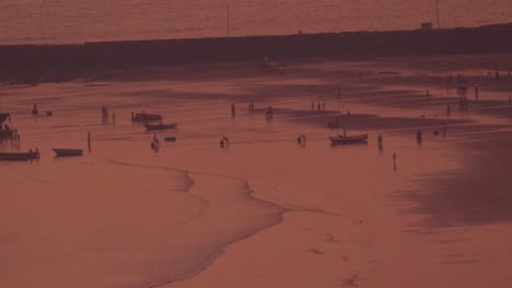 Fishermen-working-at-beachside-fishing-harbor