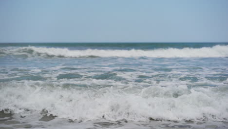 Turquoise-blue-sea-waves-splashing-in-slow-motion