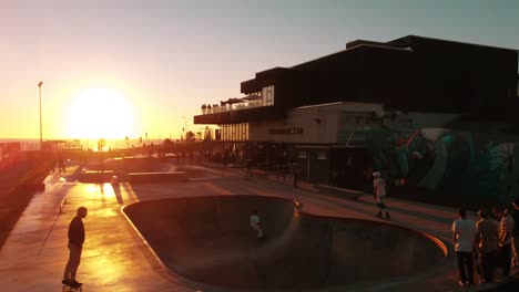 Young-People-Performing-On-Boards-In-Outdoor-Skate-Park,-Ericeira,-Portugal