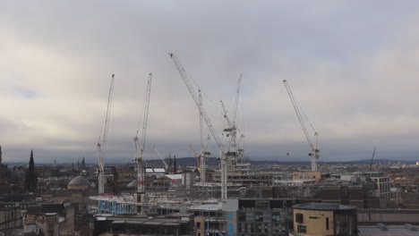 Static-view-of-multiple-cranes-in-operation-at-the-Edinburgh-St-James,-a-new-retail,-leisure,-hotel-and-residential-development-in-Edinburgh-City-centre