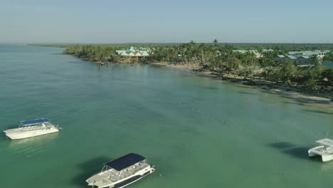 -Aerial-view-of-boats-moored-in-Bayahibe-bay,-Dominican-Republic