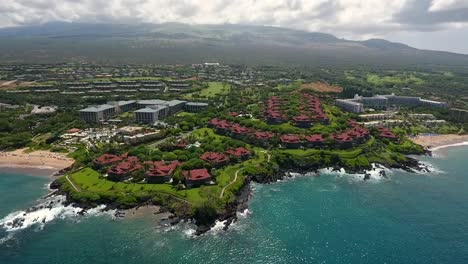 Aerial-pan-of-Wailea-Point-condos,-Maui,-a-picturesque-and-luxurious-five-star-location