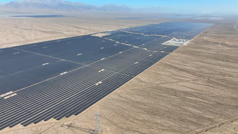 Aerial-view-of-power-station-with-solar-photovoltaic-panels-in-middle-of-desert-in-China