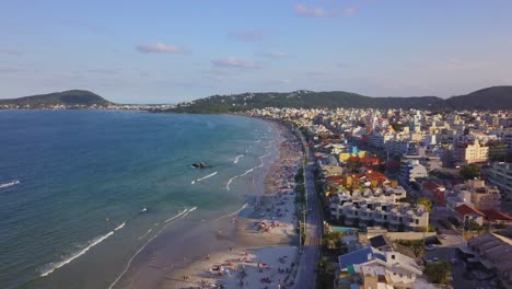 Aerial-establishing-shot-of-Bombas-beach,-a-popular-travel-destination-in-Brazil