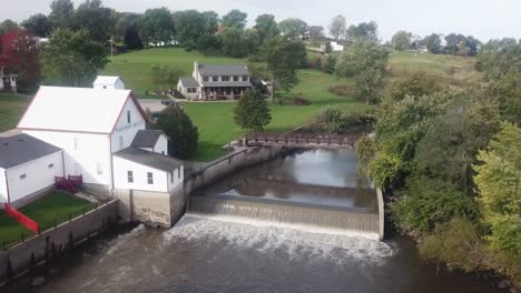 Cinematographic-aerial-footage-of-Wagaman-Mill-Museum-and-Dam-on-the-Skunk-River-in-rural-Iowa-USA