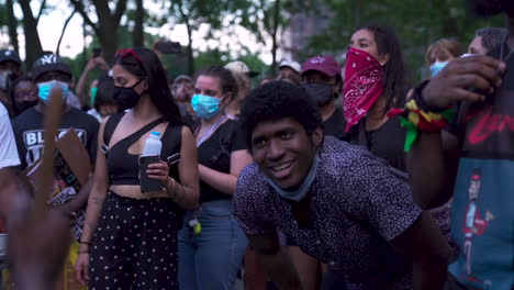 Black-Man-dancing-and-staring-at-drummer-at-a-drum-circle