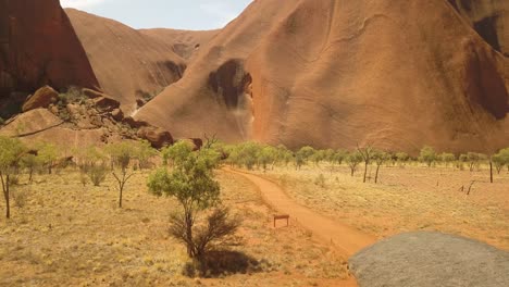 Uluru-Ayers-Rock-Australia,-static-shot-at-the-start-of-Kuniya-walking-track