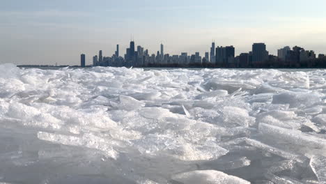 Slider-video-of-huge-chunks-of-broken-Lake-Michigan-ice-along-the-Chicago-lakefront-with-the-skyline-in-the-distance