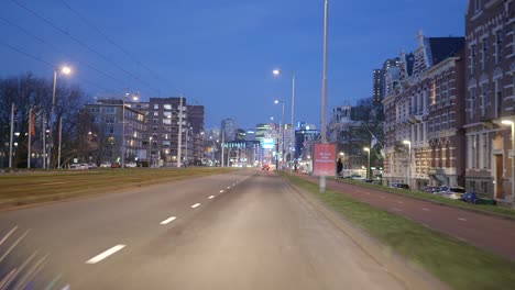 Driving-through-big-city-at-night