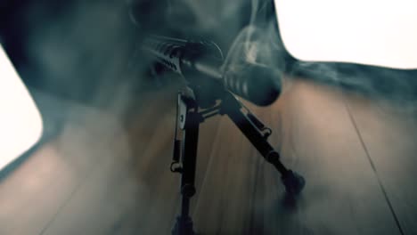 Assault-rifle-with-smoke-coming-out-of-barrel-in-slowmotion